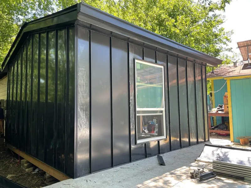 Black standing seam metal wall panels for Roof Inspection in Stallings