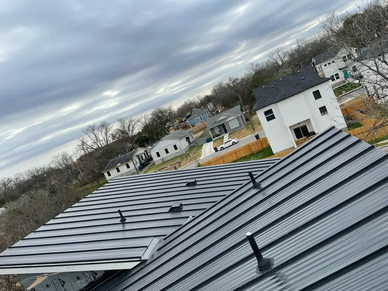 Standing seam metal roof panels with vents for Skylight Repair in Stallings